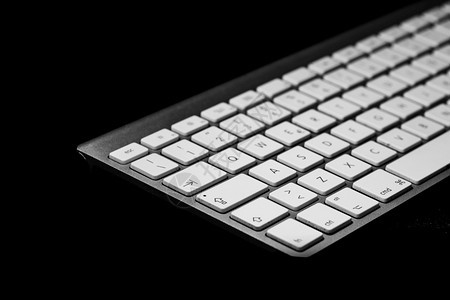 黑背景的个人计算机键盘H无线的数字沟通图片