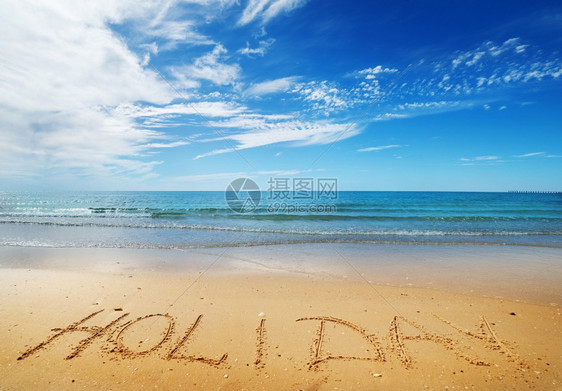 冲浪海滩沙上的假日信息假期和旅行概念水象征图片