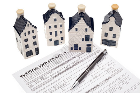 钥匙家庭贷款申请住房与白种背景孤立的房屋购买管理图片