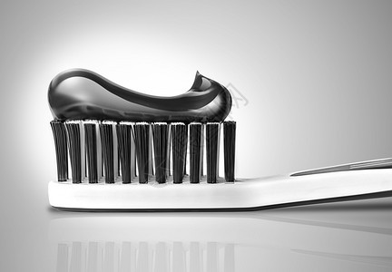 刷子涂有牙膏的刷用黑色和白3D设计口服目的图片