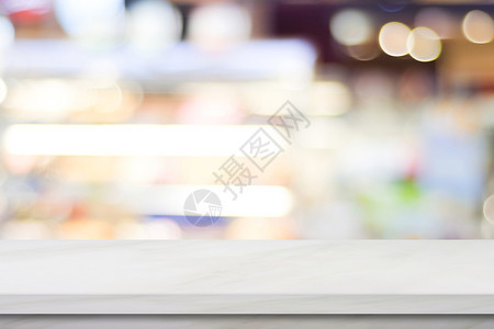柜台咖啡店架子清空的白色大理石覆盖模糊的咖啡馆背景产品和食展出背景图片