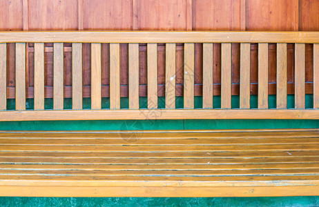 装饰品绿色当地餐馆墙附近的旧茶台长凳子放松图片