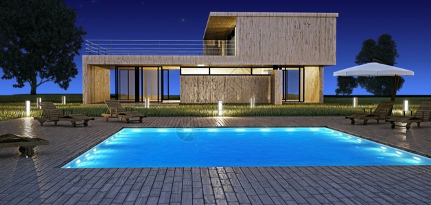 夜晚现代别墅和户外游泳池图片