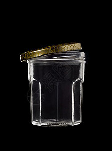 半透明黑色背景的玻璃罐上面有开放金色颜最佳oopicapi图片