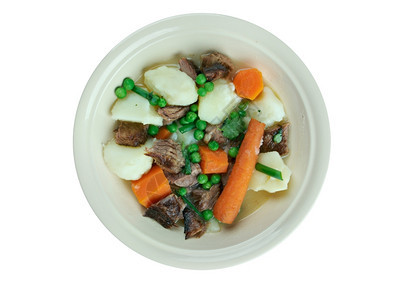 煮熟的纳瓦林法国羊肉或汤蔬菜胡萝卜图片