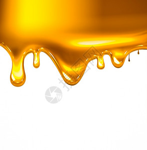 白色背景的液体金黄涂料蜂蜜或黄色涂料形象的颜闪亮图片