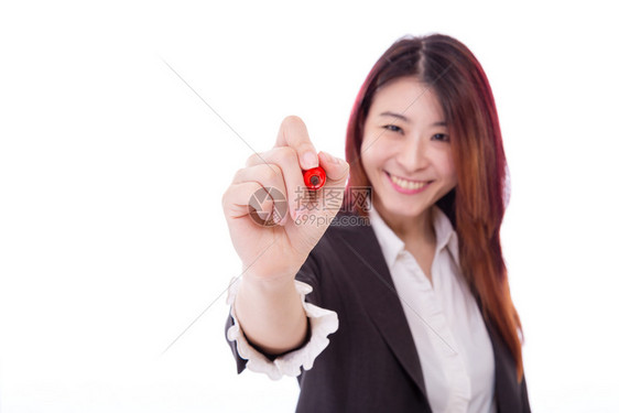 微笑快乐的亚洲女商人在虚拟屏幕上写作商业图片