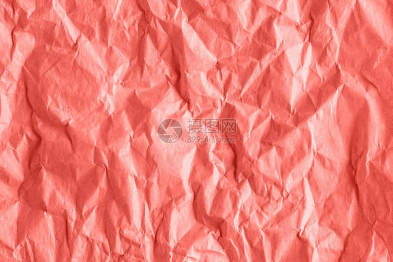 珊瑚色调抽象背景中皱褶粗糙包装纸的纹理珊瑚色调抽象背景中皱褶粗糙包装纸的纹理墙艺术皱巴的图片
