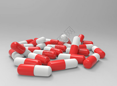 3d复制空间灰色背景的红白医生胶囊药丸组红色的团体药物图片