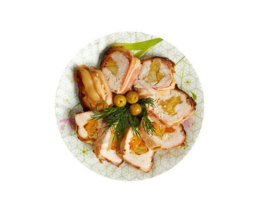 炙烤厨房肉卷包括火鸡肉和白纸上隔乳的杏仁新鲜图片