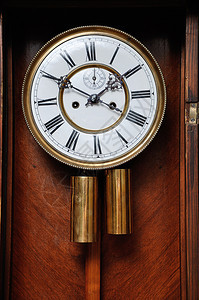 时间小白色的古董钟面图片