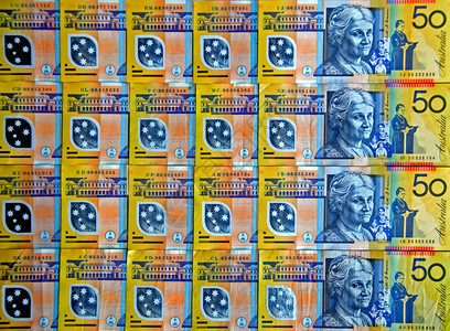 储蓄丰富多彩的黄色塑料50美元纸币澳大利人民富裕图片