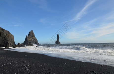 美丽的火山黑岩海礁石图片