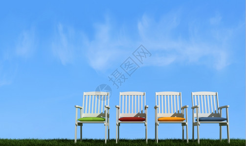 绿色一种渲染白椅子在阳光明媚的白天草地上挂着色彩多的垫子图片