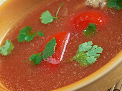 文化添加Rasam汤南印度汤用塔马林果汁作为基地加上番茄辣椒胡cumin查鲁图片