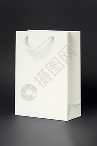 盒店铺一张黑色背景的白购物袋图像B正面图片