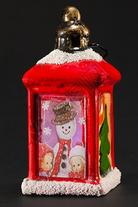 配有雪人和儿童照片的红色圣诞灯笼十二月优质的冷杉背景图片