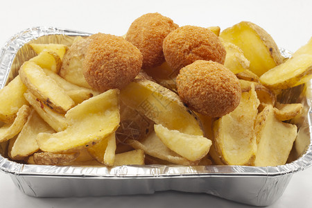 小吃薯土豆和橄榄混合油煎炒快饭速地卡路里图片
