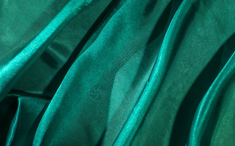 奢华闪亮的纺织品绿色面纱布背景有绿的丝绸背景图片