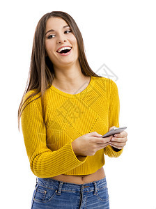 微笑技术超过美丽的女孩发短信隔着白色背景孤立的人图片