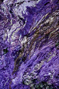 美丽的紫质装饰石背景和纹理表面轮状转盘线条裂缝斑点和污渍的抽象图案自然背景矿物学结石图片