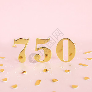 一种750号有粉红背景的金数字和文本的金面体空间钱五十图片