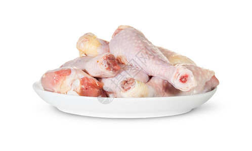 团体食物吃白板上的原鸡腿背景孤立于种图片