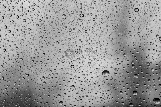 黑暗的抽象水滴可用作背景材料反射水分图片