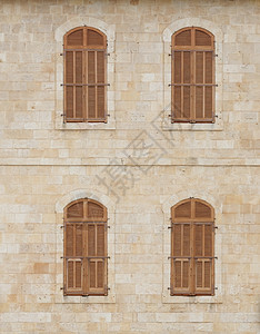 质地橙建筑学旧墙壁窗被木帘遮盖图片