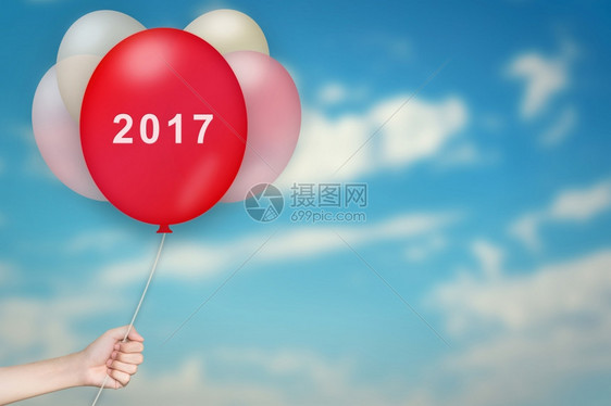 未来旅行手持2017气球天空模糊背景一月图片