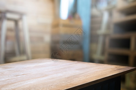 咖啡店餐厅背景模糊的咖啡厅面前空木板桌图像可以是摆放产品能够食物柜台图片