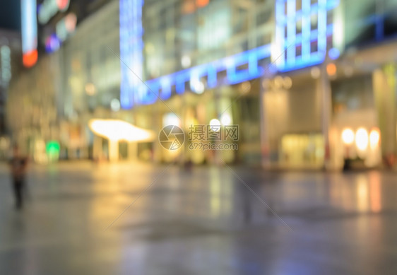 抽象的城市夜光闪亮购物中心画面模糊无光发的图片