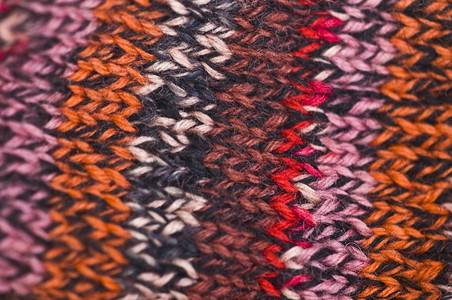 材料质地纤维在彩色条纹中剪紧一个编织的片段图片