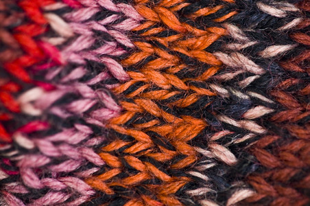 在彩色条纹中剪紧一个编织的片段衣服线条纺织品图片