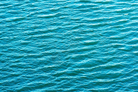 具有温柔波纹的海洋浪形成背景水液体深的图片