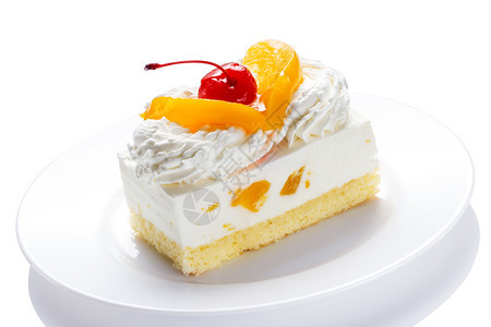 糖果奶油一块美味的蛋糕在盘子上孤立白色背景上一块美味的蛋糕在盘子上红色的图片