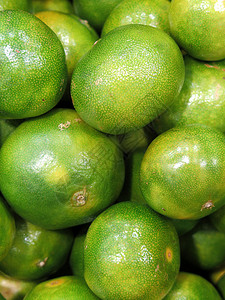 新鲜绿色橘子美味的热带水果杂货店颜色小吃图片