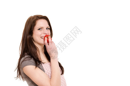 斯塔克吃西红柿的年轻女快乐的年轻女即将在白色背景下吃番茄白种人微笑图片