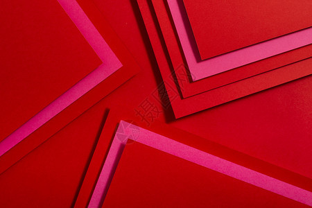 艺术工形象的红纸材料设计几何单色形状壁纸设计背景图片