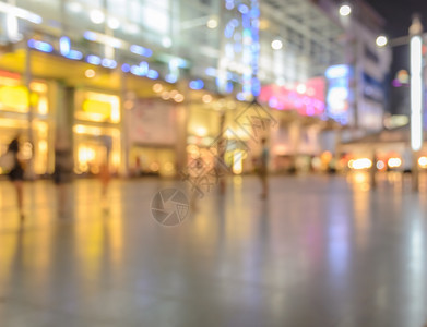 镇闪耀夜光亮的购物中心画面模糊无光旅行图片