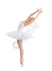女士白色背景的古典芭蕾舞裙中的美丽芭蕾舞女摆姿势演员图片