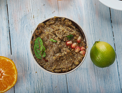 贾吉尔ShorrabitJarjirRedLentil和HutnutSquashSoup中东部菜食Levant传统各种菜盘顶视扁图片