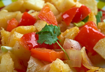 早餐OrsqioBrien番薯土豆盘以及绿色和红铃椒的油炸图片