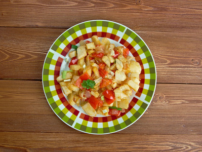 煎锅丹佛OrsqioBrien番薯土豆盘以及绿色和红铃椒布朗斯图片