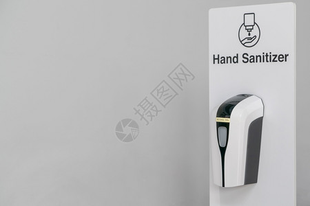 自动酒精分配器用于清洁双手的卫生站为了上市医院图片