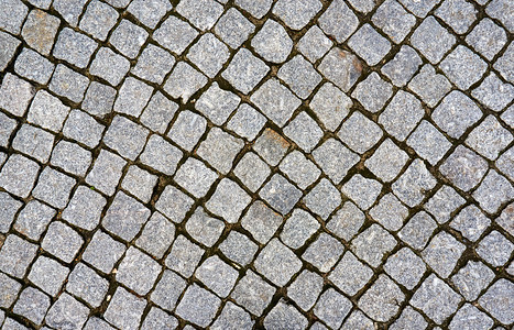 鹅卵石城市道路地面上的可塑石块人行道正方形图片