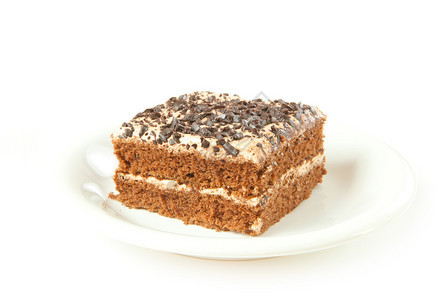 马克杯棕色的液体白底盘片棕色巧克力蛋糕图片