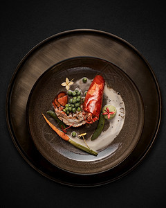 一种餐盘上美味的食物精餐盘子有创意的餐厅大概念奢华美食图片