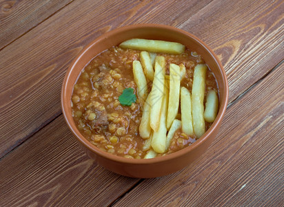 番茄盘子食物Gheimeh波斯和美索塔米亚炖肉主要成分为类西红柿白豆洋葱图片