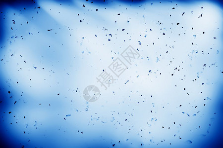 纸质纹理上的粉尘粒子背景为hd纸质纹理背景上的粉尘粒子抽象充满活力蓝色的图片
